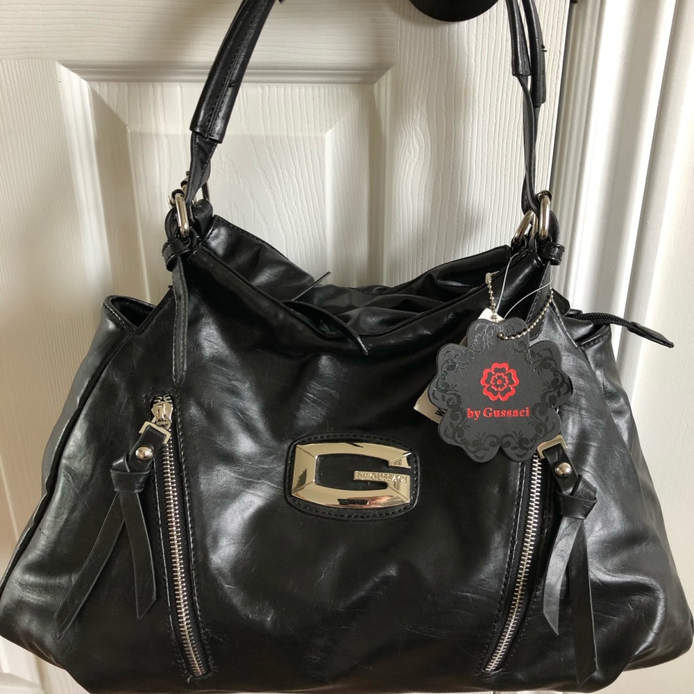 Stylish GUSSACI Black Purse with full zip up, pockets and full lining
